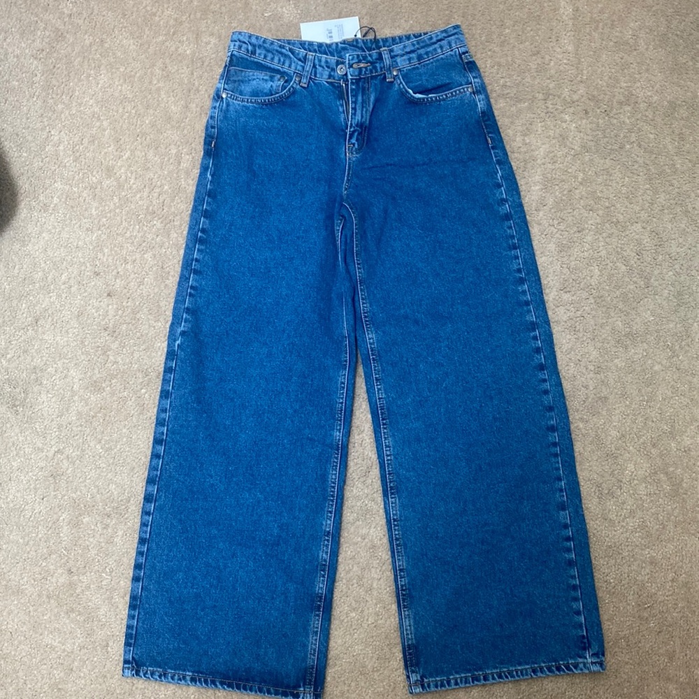 Free people Ragged low rise baggy blue jeans